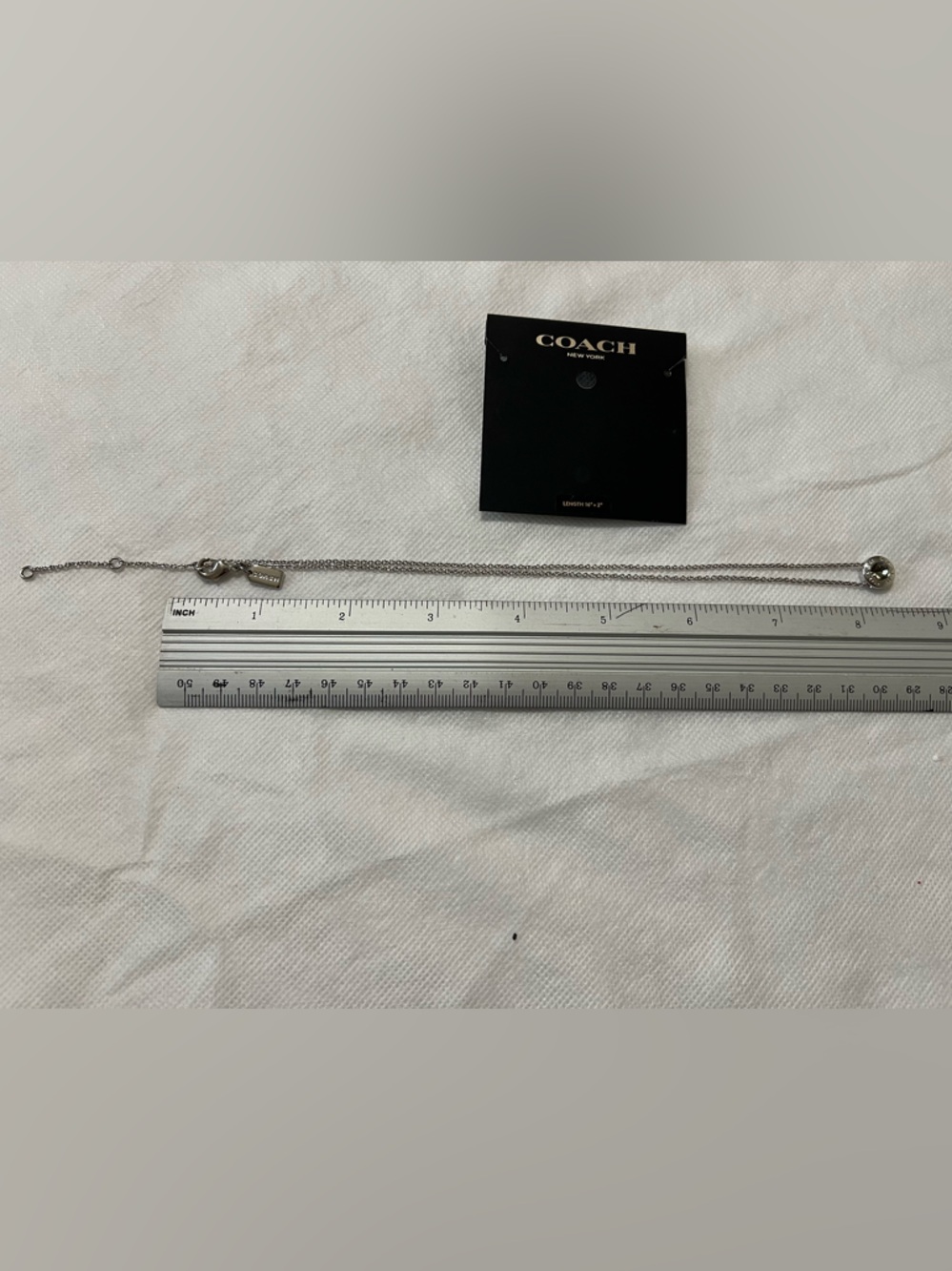 COACH Silver-Tone Crystal Accent Pendant Necklace - Picture 4 of 7